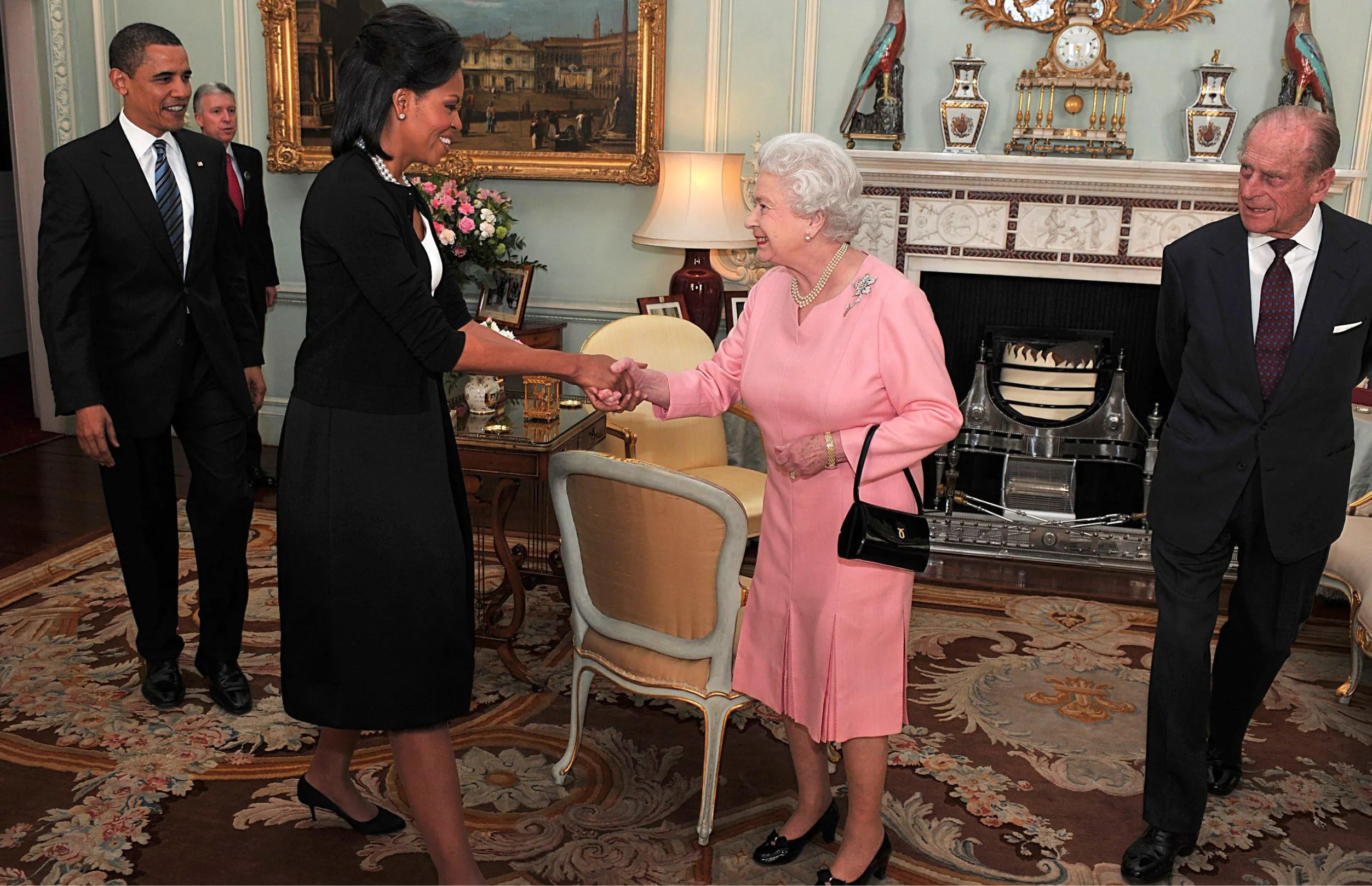 Queen Elizabeth II greeting Michelle Obama at Buckingham Palace
